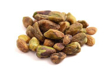 Obraz premium Shelled Roasted and Salted Pistachios Isolated on a White Background
