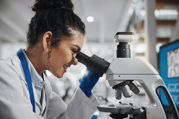 Microscope, woman check and research of science study with healthcare, scientist and laboratory...