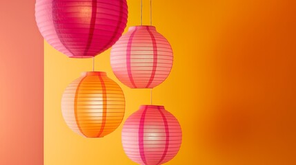 Vibrant Paper Lanterns Hanging for Diwali Greeting on Orange Background