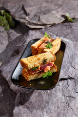 Delicious Japanese Sando Sandwich with Tuna on Rustic Slate Background