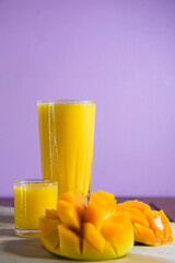 Mango king juice with mango fruits. Fresh mango juice.
