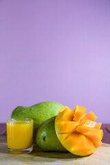 Mango juice with mango slice isolated on white background. glass of mango juice.
