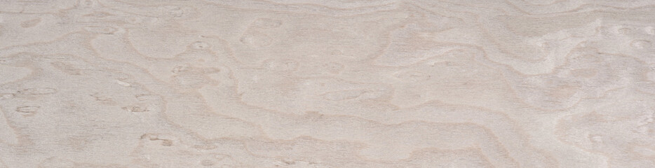 Whispering cream and beige, the veneer wood surface reveals nature's artistry