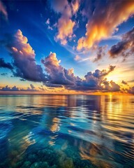 beautiful evening sunset, blue sea, vibrant colors, sun setting over the horizon