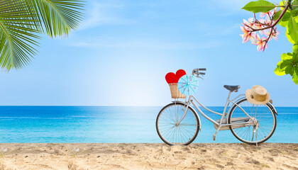 Fototapeta premium Bicycle on tropical beach, summer concept background, outdoor day light