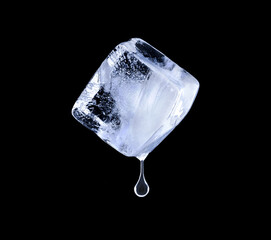 Droplet with ice cube on a black background izolvanomu