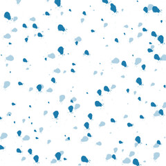 Abstract texture of blue splashes on a white background.