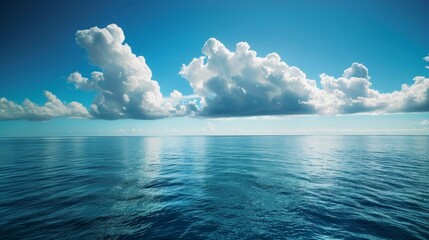 Obraz premium The sea's infinite expanse, stretching as far as the eye can see, fills the heart with a sense of wonder and awe at the sheer magnitude of creation.