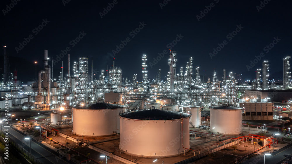 Wall mural aerial view oil and gas refinery at night, business petrochemical industry refinery oil and gas fact