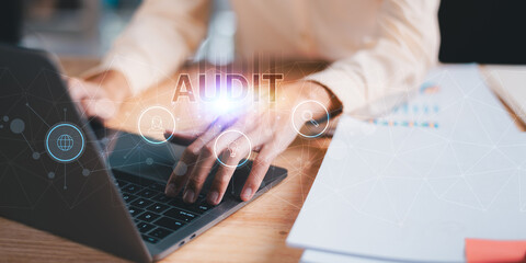 Accountant showing office document auditing concept ,plan review process and assess correctness...