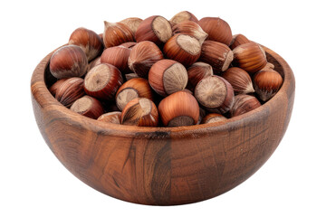 Hazelnuts in a wooden bowl isolated on transparent background