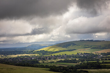 Moody cloudy skies above the south downs in west Sussex from Steyning bowl in south east England UK