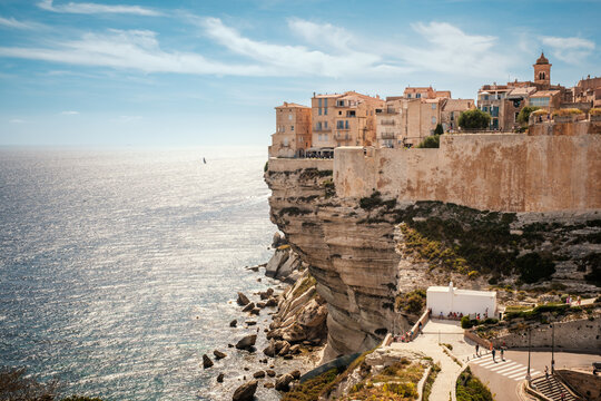 The citadel of Bonifacio in Corsica where houses are perched above the Mediterranean sea on limestone cliffs which have been undercut by the sea and weather