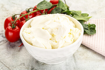 Soft cream cheese in the bowl