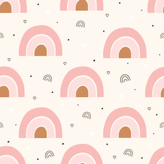 Cute childish seamless pattern with rainbows in boho style in pastel shades