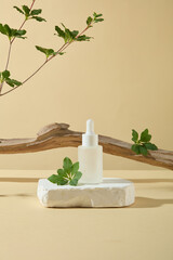 Mockup for advertising cosmetic products, which extracted from natural ingredient. The blank label bottle in white displayed on plaster platform, a log and branch tree decorated in back