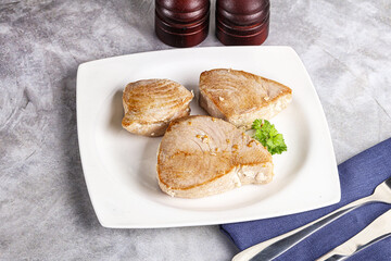 Roasted red tuna steak in the plate