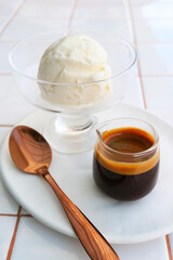Shot of espresso coffee with vanilla ice cream for bitter sweet Affogato