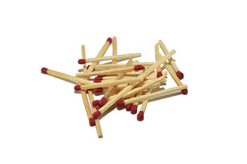 Ordinary wooden matches with a sulfur head lie on white.
