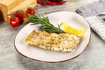 Baked salmon fish served rosemary