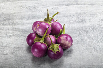 Raw small purple asian baby eggplant