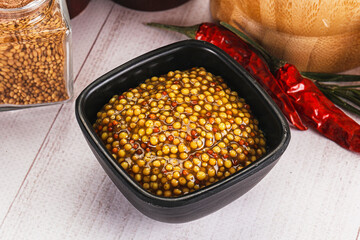 Spicy mustard sauce with seeds