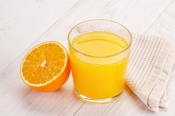 Sweet fresh orange juice in the glass