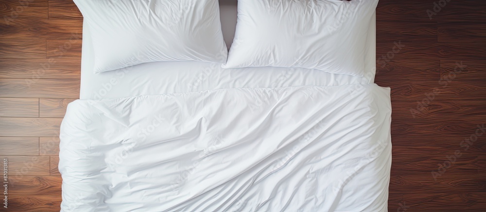 Poster top view flat lay of bedding sheets with ample copy space image.