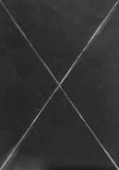 Blank folded black white creased crumpled paper texture background old grunge ripped torn vintage, for collage posters or overlay effect