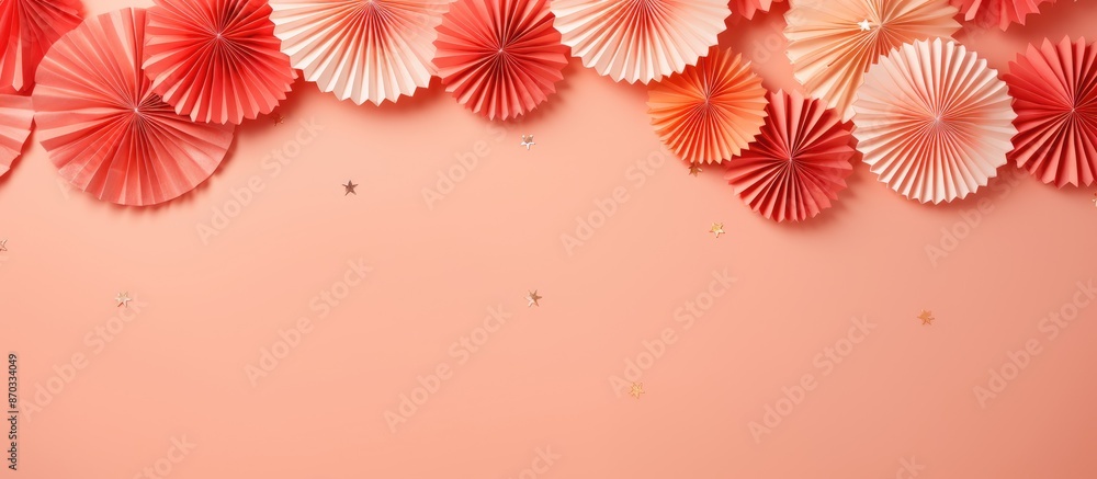 Poster An aerial view of party decorations like blowers and streamers on a coral background, providing room for text in the image. with copy space image. Place for adding text or design