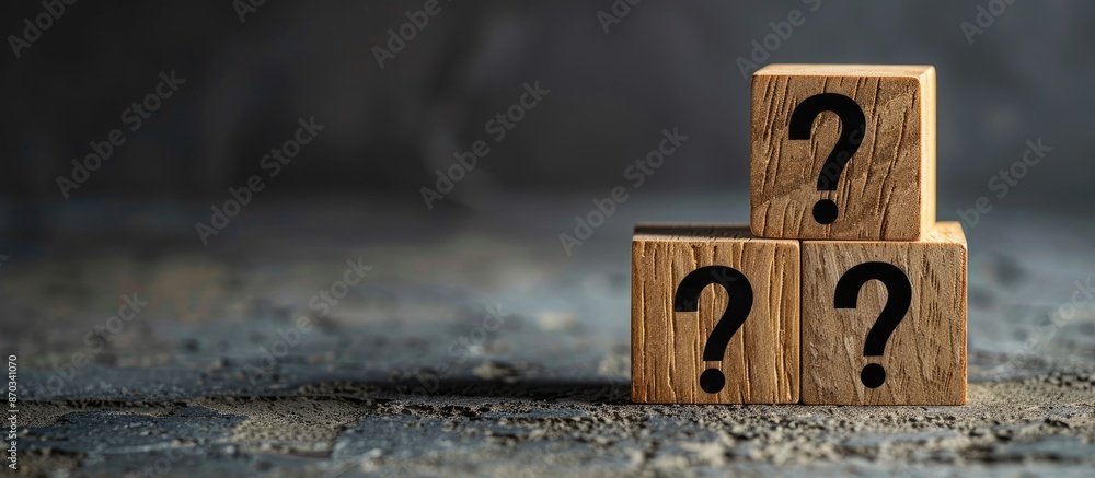 Poster Three wooden blocks with a question mark, set against a dark background with copy space image.