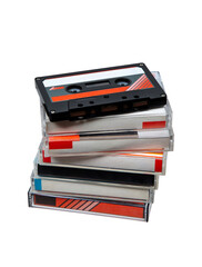 Close-up of many audio tapes. Analog storage medium. Cassettes for audio recordings and music. Isolate on a white back