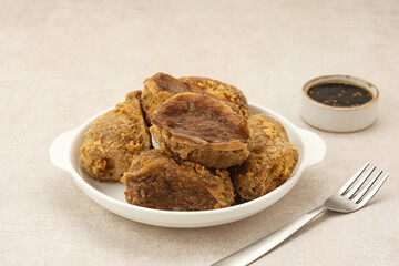 Tahu Walik, fried tofu stuffed with meatball. Indonesian food
