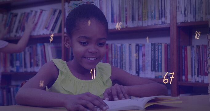 Image of numbers and symbols floating over african american girl studying in library at school - Powered by Adobe