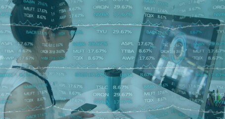 Image of trading board over asian woman sketching on desktop using graphics tablet