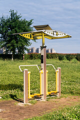 Exercise machines and fitness equipment in the street outdoor gym in city park