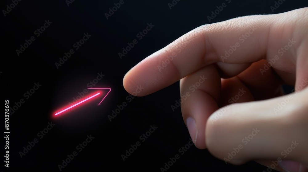 Poster a hand pointing to a red arrow on a black background. concept of direction and movement, as if the h