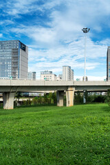 city park with modern building background in shanghai