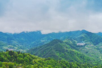 Fototapeta premium Shooting Beautiful Villages in High Mountain Canyon of Anhui Province, China from the Sky