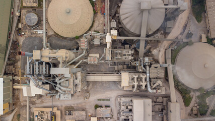 Aerial view cement factory, Cement product plant silo towers, pipes structure industrial, Cement manufacturing plant