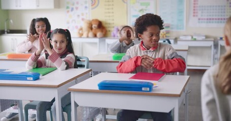 Children, applause and happy for presentation in classroom with oral, public speaking and support for girl. School kids, diversity and excited for speech with clapping hands, smile and motivation