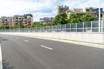 Obraz premium Empty urban road and buildings in the city