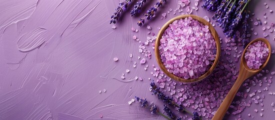 Purple background enhances lavender bath salt display with spoon, dried lavender, and generous copy space image.