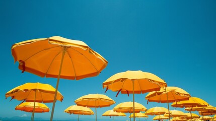 Beach umbrellas dot the landscape, offering shade from the sun's relentless rays.
