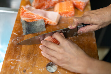 A tantalizing series showcasing the delicate art of preparing and presenting salmon sashimi