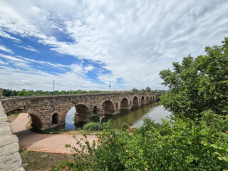 Historic roman bridge over the Guadiana river in Merida, Spain