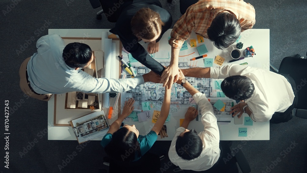 Aufkleber top view of smart manager clapping hands and putting hands together to celebrate project. aerial vie
