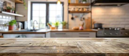 Fototapeta premium Blurry kitchen room as a background for a table top with copy space image.