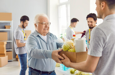 Poor old man gets food aid. Senior citizen who belongs to vulnerable social group gets help at...