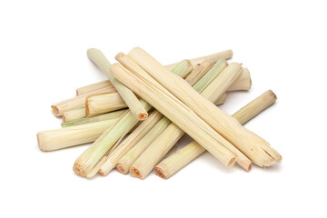A pile of Dry Organic lemongrass (Cymbopogon flexuosus) sticks, isolated on a white background.